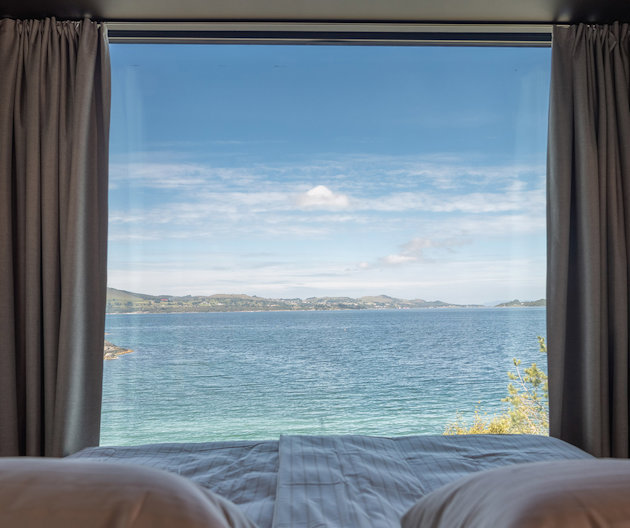 a view of the ocean from a window